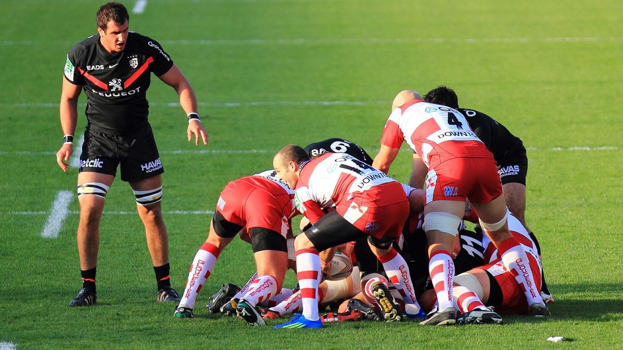 Toulouse and Gloucester players at a ruck in a 2011 Heineken Cup match