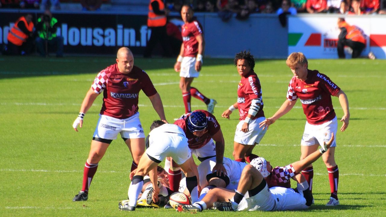 Players competing at a ruck in a Top 14 match between Toulouse and Bordeaux-Begles